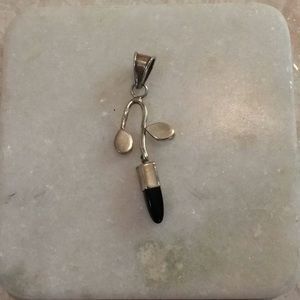 Silver and onyx pendant. No chain